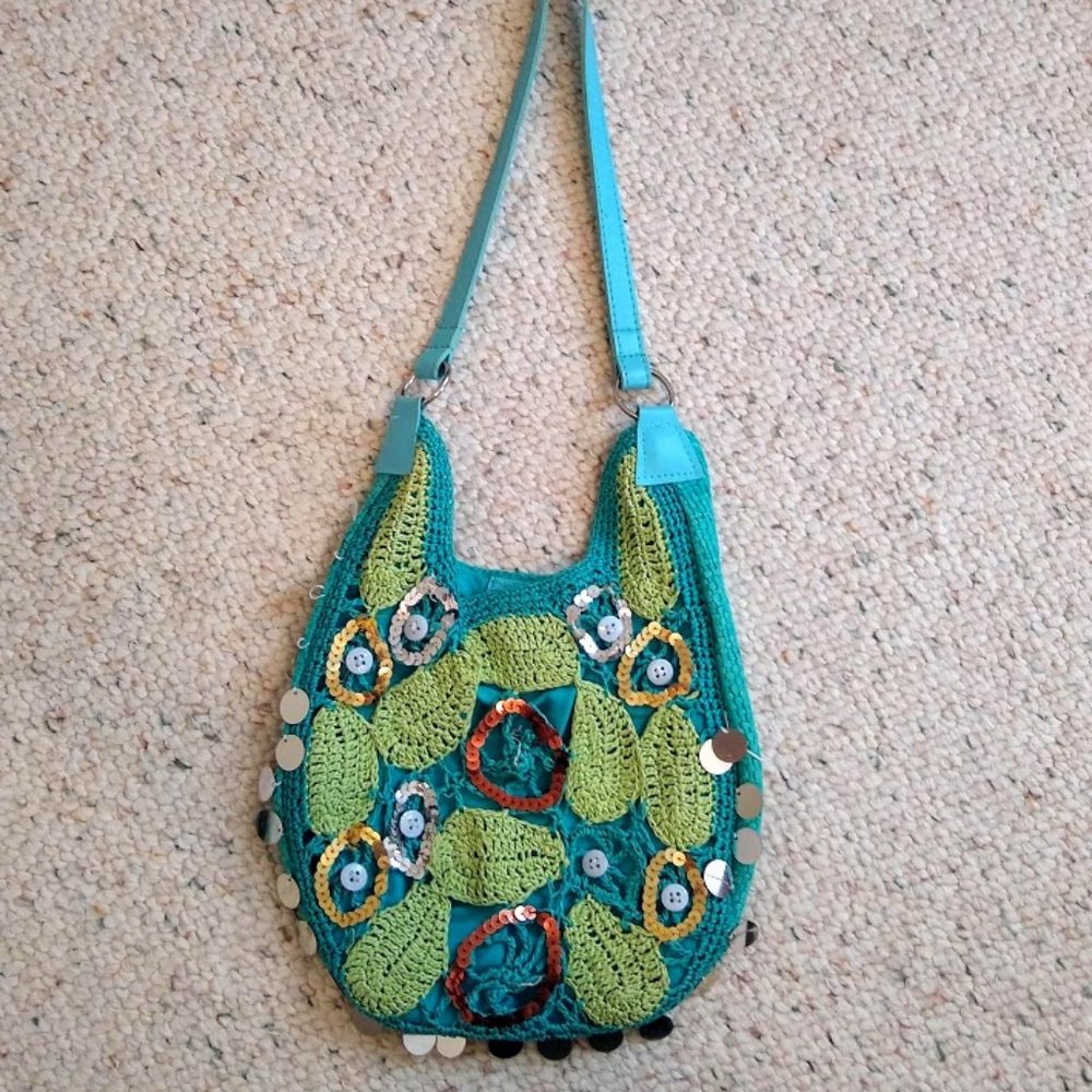 Woven, sequined turqoise handbag